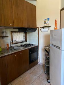 Kuchyň nebo kuchyňský kout v ubytování Casa di Paola mare Ardea