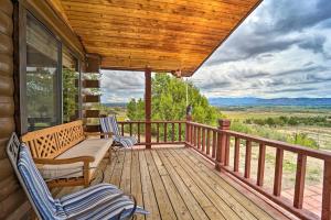 a porch with chairs and a bench on a deck at Sprawling Mountain-View Cabin 5 Mi to Mesa Verde in Mancos