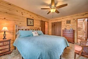 a bedroom with a bed and a ceiling fan at Sprawling Mountain-View Cabin 5 Mi to Mesa Verde in Mancos