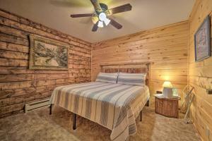 a bedroom with a bed and a ceiling fan at Sprawling Mountain-View Cabin 5 Mi to Mesa Verde in Mancos