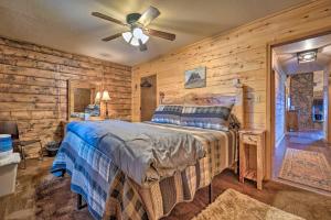 a bedroom with a bed and a ceiling fan at Sprawling Mountain-View Cabin 5 Mi to Mesa Verde in Mancos