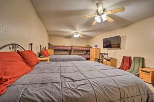 a bedroom with two beds and a ceiling fan at Sprawling Mountain-View Cabin 5 Mi to Mesa Verde in Mancos