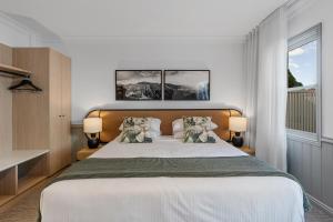 Wildes Hotel Kangaroo Valley客房内的一张或多张床位