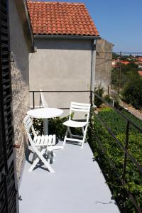 Zdjęcie z galerii obiektu Holiday apartments Veli Iz, Iz - 6253 w mieście Mali Iž