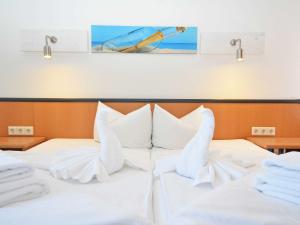 Ein Bett oder Betten in einem Zimmer der Unterkunft Wohnpark Stadt Hamburg - Apt. 01