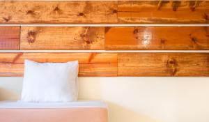 Postel nebo postele na pokoji v ubytování Garden Villa Hotel