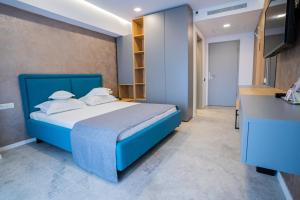Кровать или кровати в номере Hotel Prestige