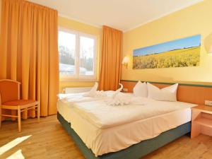 Ein Bett oder Betten in einem Zimmer der Unterkunft Wohnpark Stadt Hamburg - Apt. 15