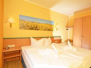 Ein Bett oder Betten in einem Zimmer der Unterkunft Wohnpark Stadt Hamburg - Apt. 15