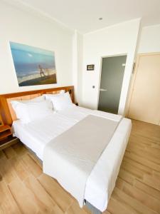 Postel nebo postele na pokoji v ubytování Eleni's Sea View Adults only