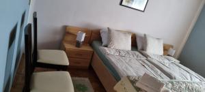 Postel nebo postele na pokoji v ubytování APARTMA ŽELE