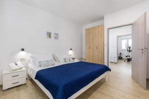 Rúm í herbergi á Luxurious apartments Bona fide