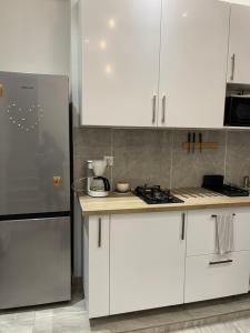 Kuchyň nebo kuchyňský kout v ubytování EVE HOME
