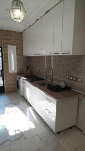 Kuchyň nebo kuchyňský kout v ubytování EVE HOME