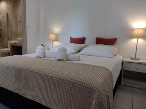 Posteľ alebo postele v izbe v ubytovaní Marios Garden House
