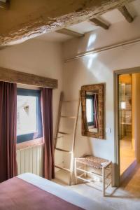 Posteľ alebo postele v izbe v ubytovaní El Molino de Besalú Casa con jardín