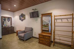 TV a/nebo společenská místnost v ubytování Avenra Cottage