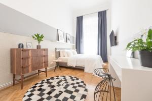 Posteľ alebo postele v izbe v ubytovaní Venus Apartments - Opera I