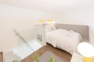 Posteľ alebo postele v izbe v ubytovaní Venus Apartments - Opera I