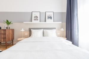 Posteľ alebo postele v izbe v ubytovaní Venus Apartments - Opera I