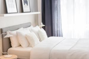 Posteľ alebo postele v izbe v ubytovaní Venus Apartments - Opera I