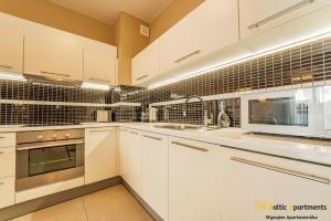 Kuchnia lub aneks kuchenny w obiekcie Baltic Apartments - Portofino