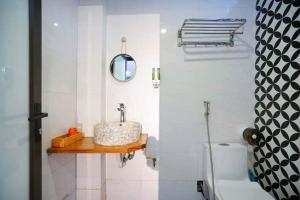 a bathroom with a sink and a tub at 5 to 10 bedrooms houses in Ha Long +64 photos