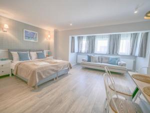 Posteľ alebo postele v izbe v ubytovaní Flatbook - Old Town Apartments Spichrzowa 21