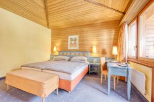 Letto o letti in una camera di Hotel Simi