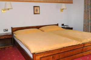 Letto o letti in una camera di Hotel Simi