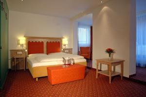 Letto o letti in una camera di Hotel Simi