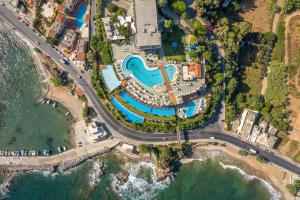 an aerial view of a resort next to the ocean at Leptos Panorama Hotel in Kalamaki Chanion