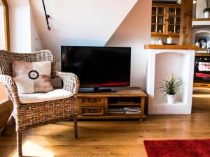 Μια τηλεόραση ή/και κέντρο ψυχαγωγίας στο Apartament w Osadzie Podhalańskiej