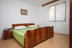 Posteľ alebo postele v izbe v ubytovaní Apartments with parking space Metajna, Pag - 6423