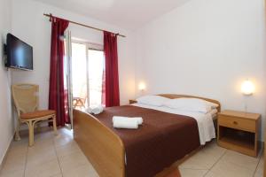 Postel nebo postele na pokoji v ubytování Apartments and rooms with parking space Mandre, Pag - 6309