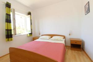 Postel nebo postele na pokoji v ubytování Apartments and rooms with parking space Mandre, Pag - 6309