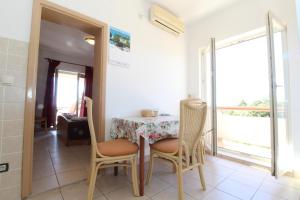 Posezení v ubytování Apartments and rooms with parking space Mandre, Pag - 6309