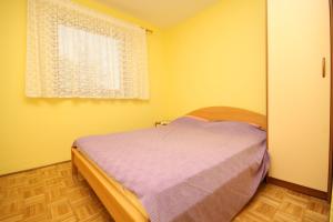Postel nebo postele na pokoji v ubytování Apartments with a parking space Povljana, Pag - 6297