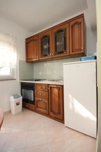 Kuchyň nebo kuchyňský kout v ubytování Apartments with a parking space Povljana, Pag - 6297