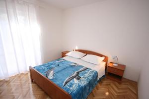 Postel nebo postele na pokoji v ubytování Apartments by the sea Stara Novalja, Pag - 6375