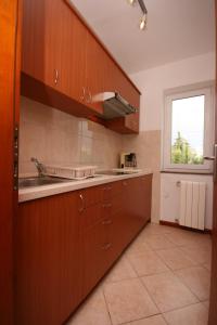 Kuchyň nebo kuchyňský kout v ubytování Apartments with a parking space Novalja, Pag - 6398