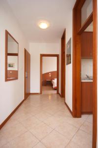 Postel nebo postele na pokoji v ubytování Apartments with a parking space Novalja, Pag - 6398