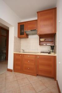 Kuchyň nebo kuchyňský kout v ubytování Apartments with a parking space Novalja, Pag - 6398