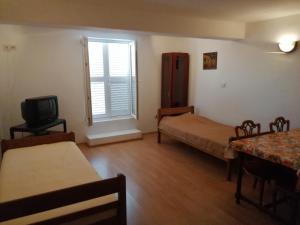Postel nebo postele na pokoji v ubytování Apartments with parking spaces Kustici, Pag - 6392