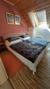 a bedroom with two beds in a room at Víkendový Dom U Vasila in Krahule