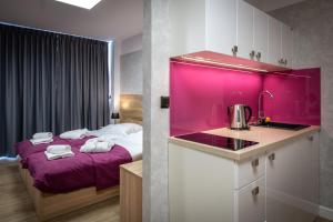 En eller flere senge i et værelse på Jubilat