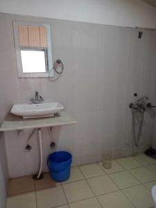 Kylpyhuone majoituspaikassa SPOT ON Hotel Rudra