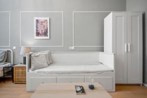 A bed or beds in a room at Venus Apartments - Akacfa I