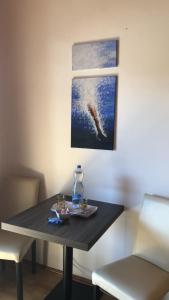 Posedenie v ubytovaní Casa Boebelle