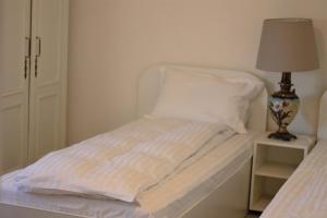 Postel nebo postele na pokoji v ubytování Casa Sommer